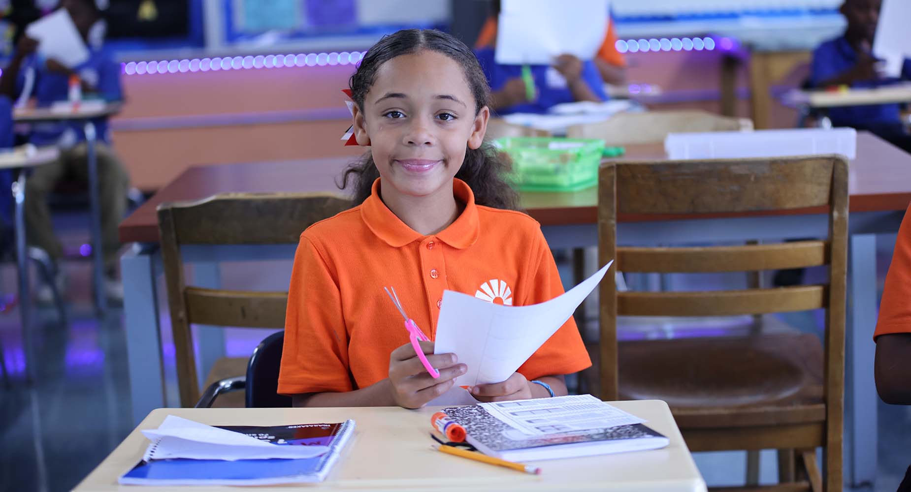 Teacher helping student