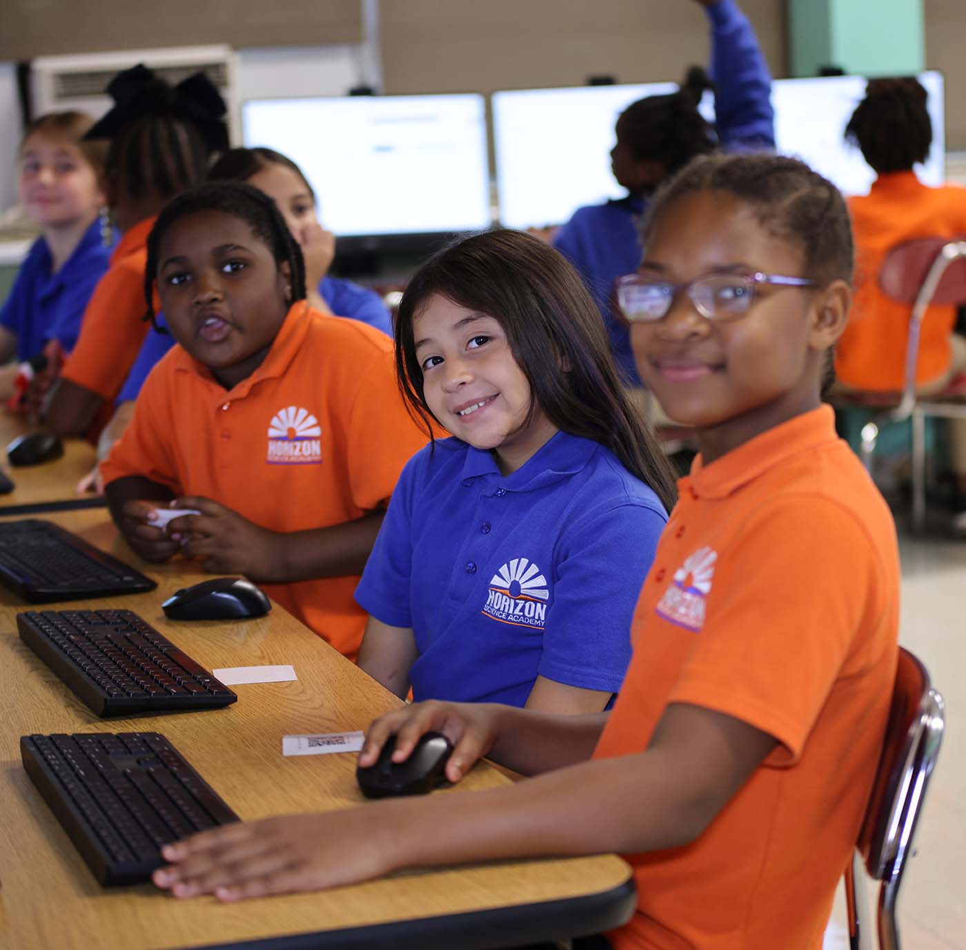 Horizon Science Academy Youngstown student drawing at a desk in a classroom setting